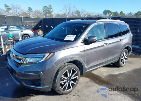 2022 Honda Pilot 2Wd Touring 7 Passenger z USA, uszkodzony, nr VIN 5FNYF5H67NB011450
